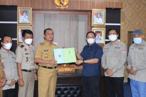Pemkab Way Kanan Serahkan Aset Ke KPU